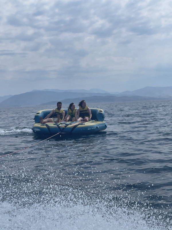 Amy, Gavin, and Mini McGavin on the inflatable sofa